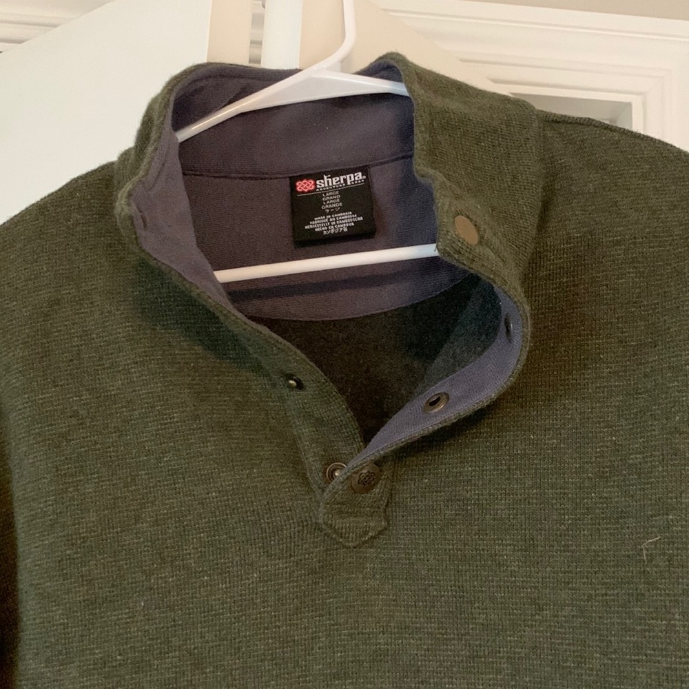 Men’s green Sherpa Adventure Gear sweater